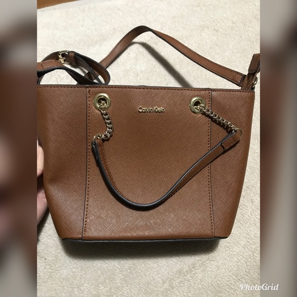 Calvin Klein Handbags - Calvin Klein bucket crossbody bag.